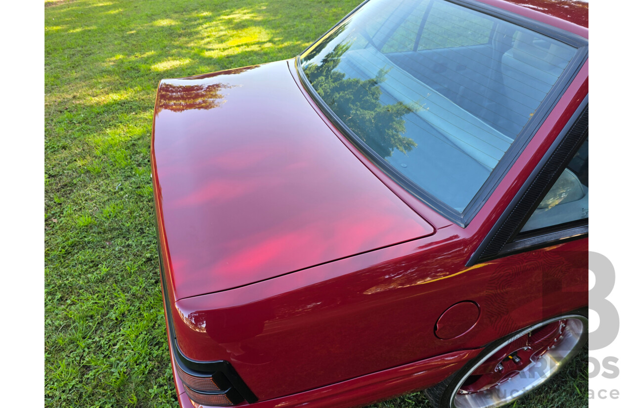 04/1987 Holden VL Commodore Executive 4d Sedan Burgundy V8 5.0L - Modified