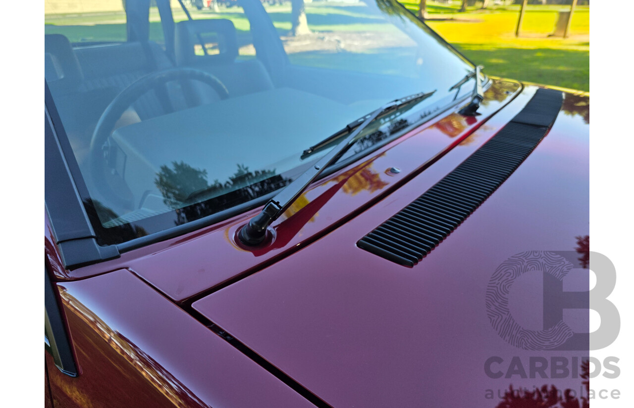 04/1987 Holden VL Commodore Executive 4d Sedan Burgundy V8 5.0L - Modified