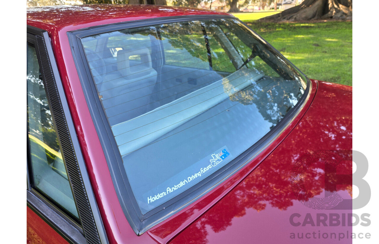 04/1987 Holden VL Commodore Executive 4d Sedan Burgundy V8 5.0L - Modified
