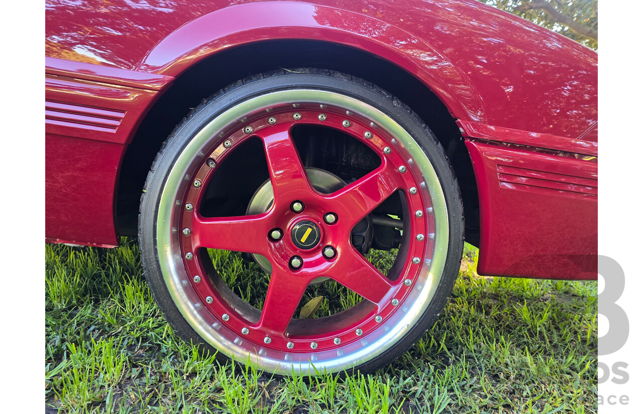 04/1987 Holden VL Commodore Executive 4d Sedan Burgundy V8 5.0L - Modified