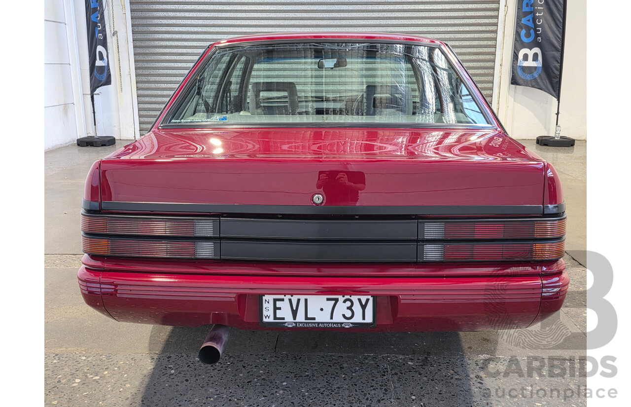 04/1987 Holden VL Commodore Executive 4d Sedan Burgundy V8 5.0L - Modified