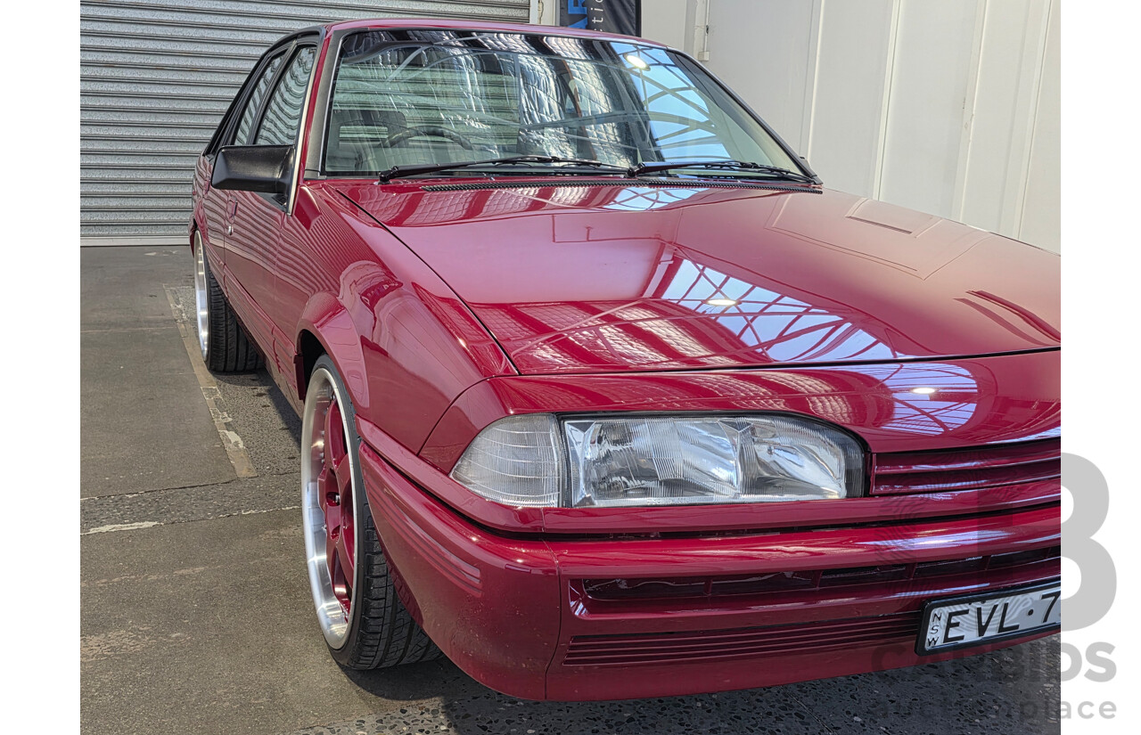 04/1987 Holden VL Commodore Executive 4d Sedan Burgundy V8 5.0L - Modified