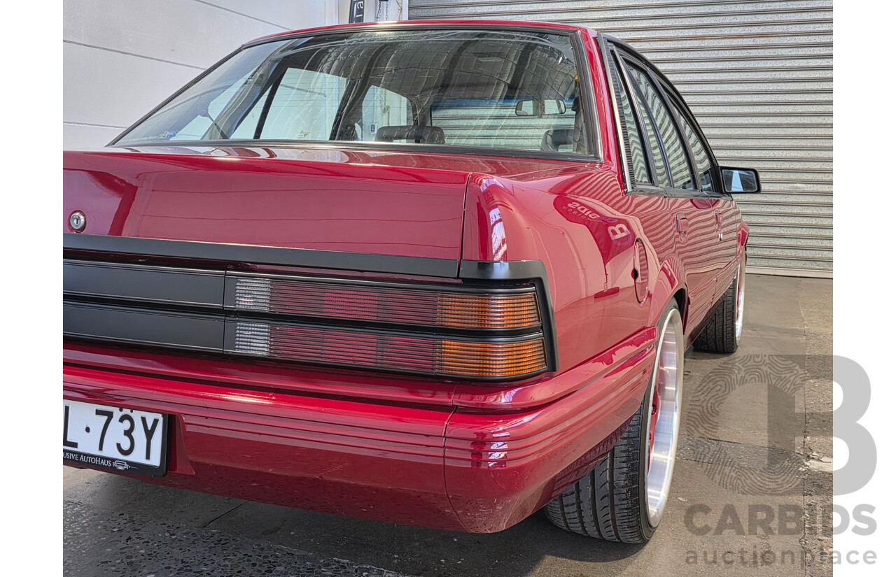 04/1987 Holden VL Commodore Executive 4d Sedan Burgundy V8 5.0L - Modified