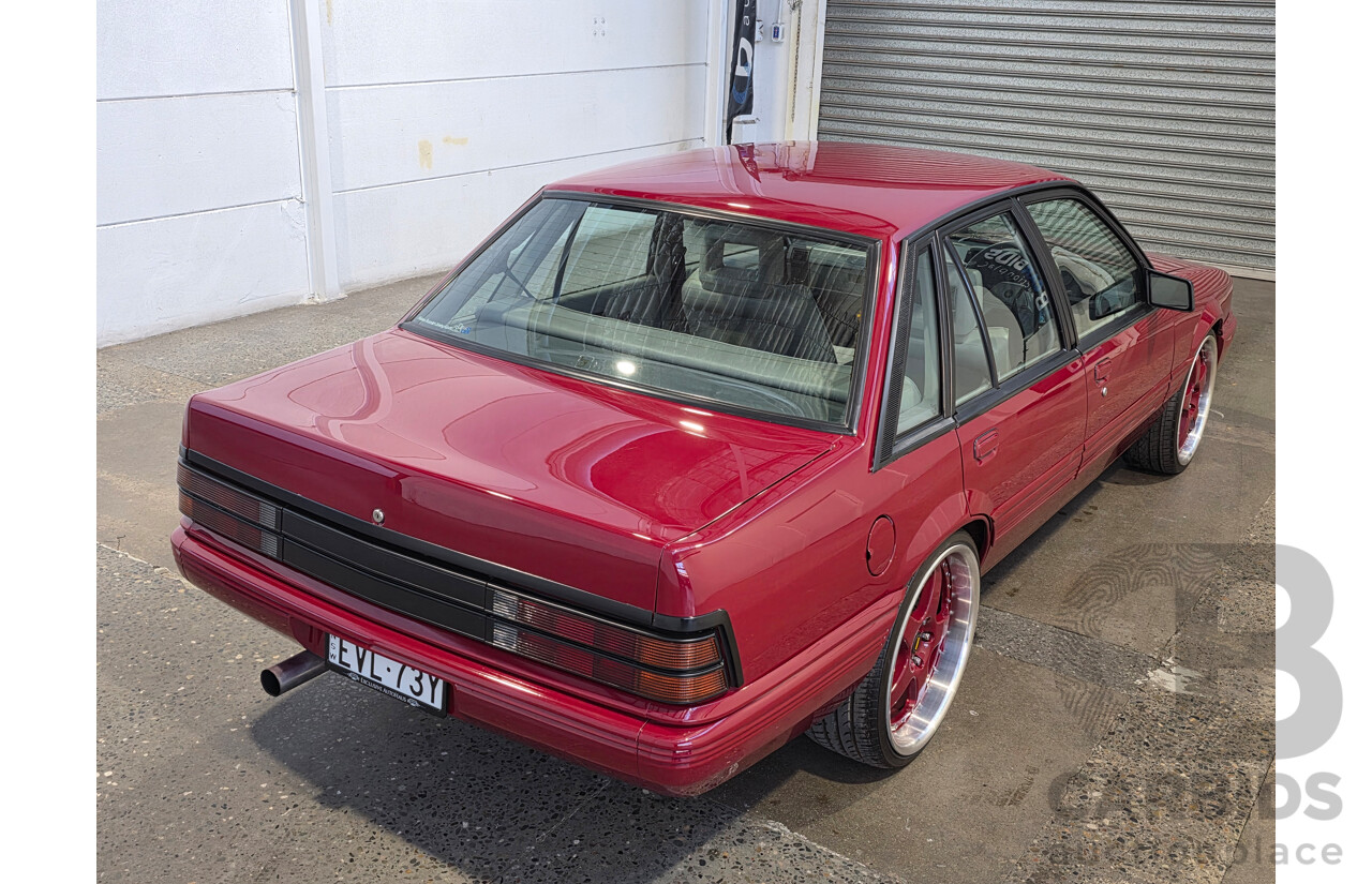 04/1987 Holden VL Commodore Executive 4d Sedan Burgundy V8 5.0L - Modified