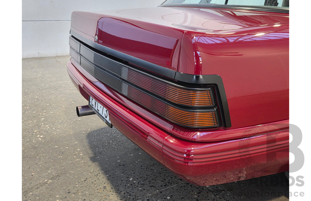 04/1987 Holden VL Commodore Executive 4d Sedan Burgundy V8 5.0L - Modified