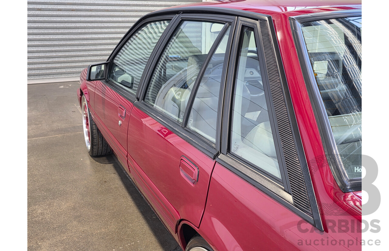 04/1987 Holden VL Commodore Executive 4d Sedan Burgundy V8 5.0L - Modified