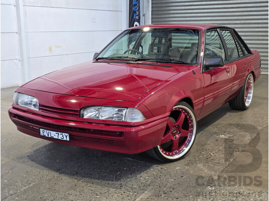 04/1987 Holden VL Commodore Executive 4d Sedan Burgundy V8 5.0L - Modified