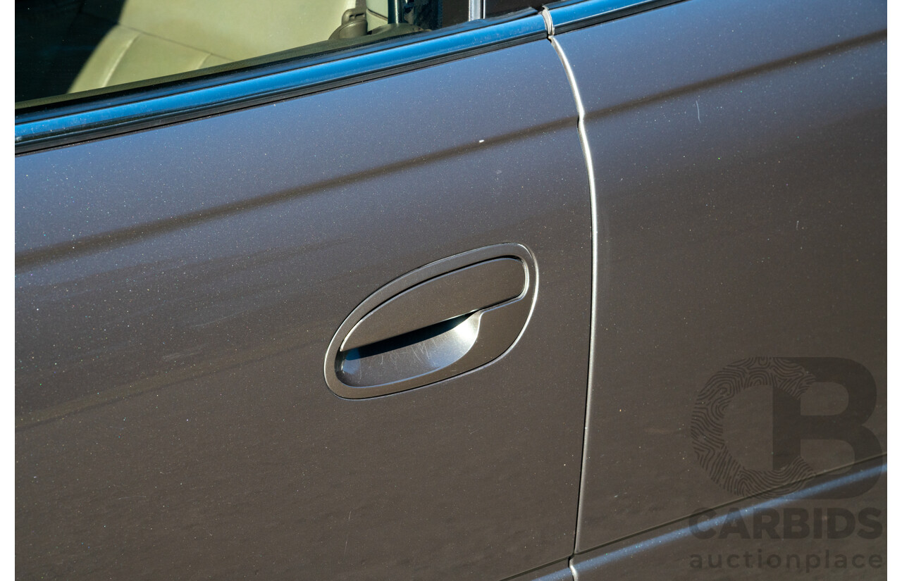 04/2003 Holden Special Vehicles (HSV) VY Senator Signature No.96 4d Sedan Turbine Grey Metallic V8 5.7L