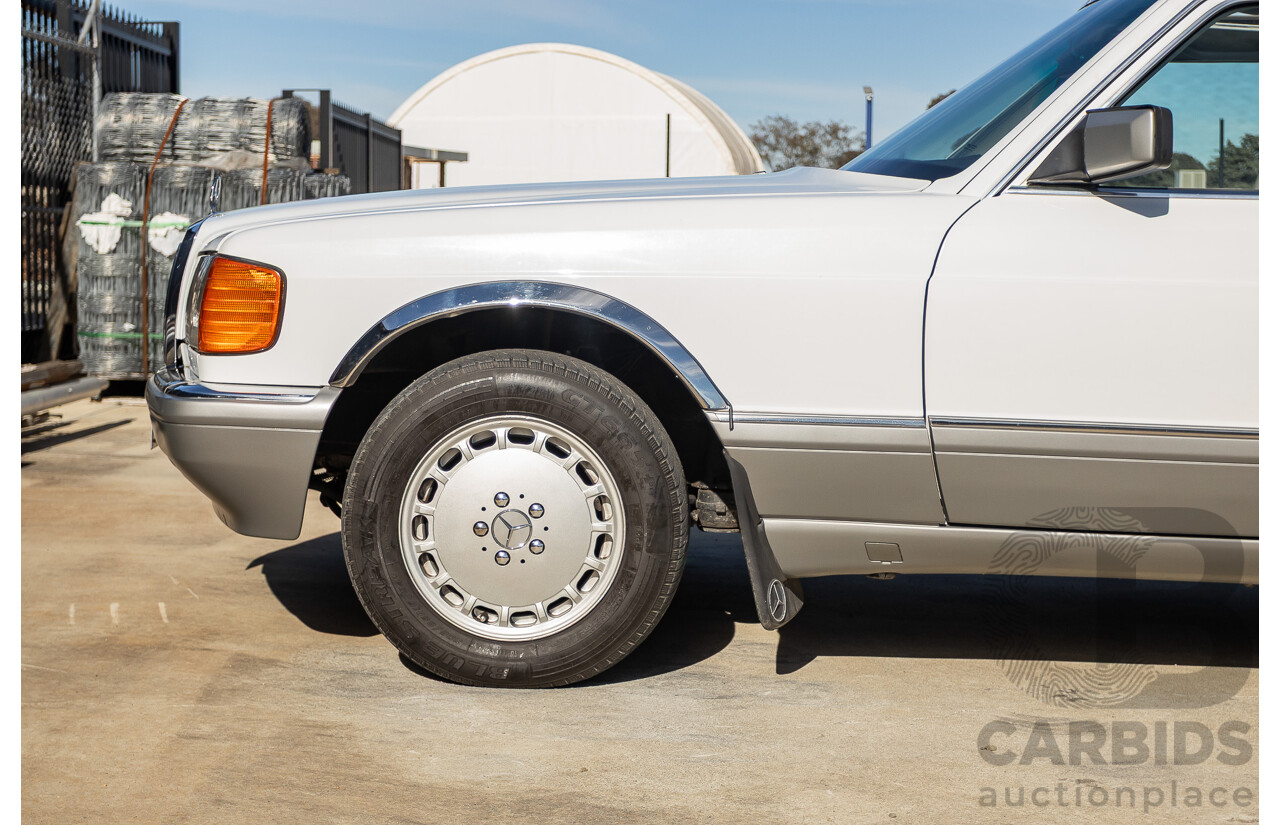 4/1988 Mercedes-Benz 300SE W126 4d Sedan Arctic White 3.0L
