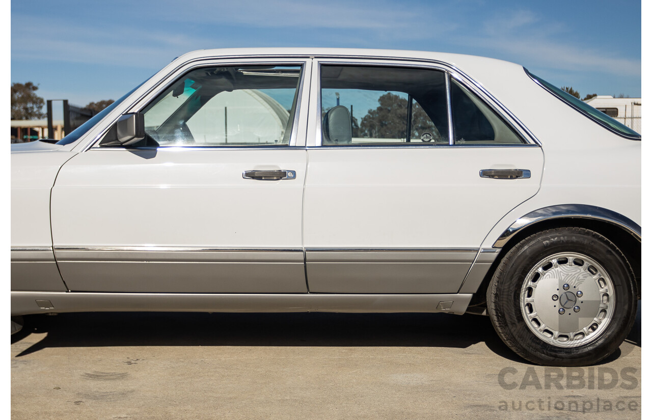 4/1988 Mercedes-Benz 300SE W126 4d Sedan Arctic White 3.0L