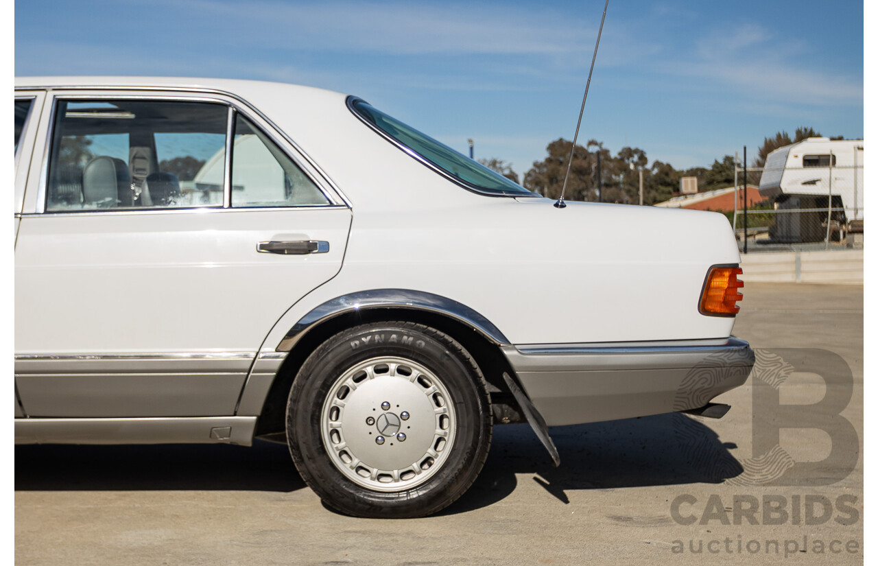 4/1988 Mercedes-Benz 300SE W126 4d Sedan Arctic White 3.0L