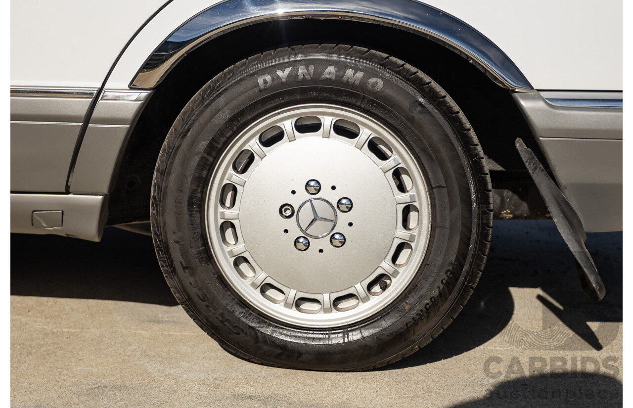 4/1988 Mercedes-Benz 300SE W126 4d Sedan Arctic White 3.0L