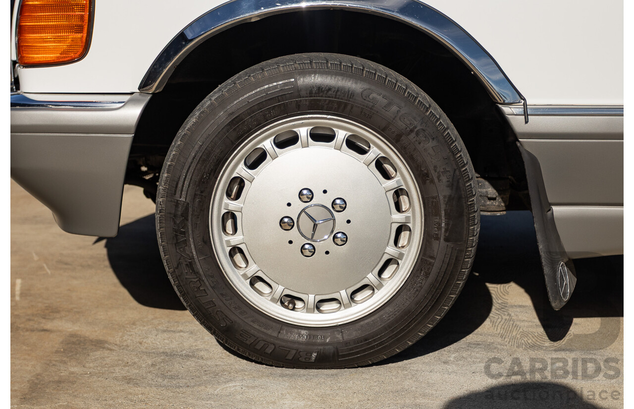 4/1988 Mercedes-Benz 300SE W126 4d Sedan Arctic White 3.0L