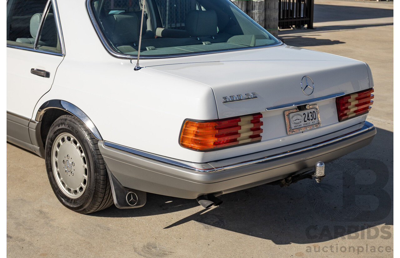 4/1988 Mercedes-Benz 300SE W126 4d Sedan Arctic White 3.0L