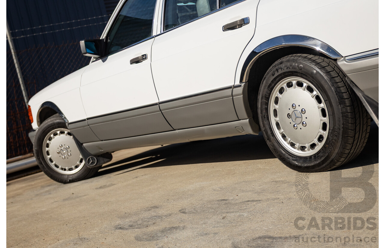 4/1988 Mercedes-Benz 300SE W126 4d Sedan Arctic White 3.0L