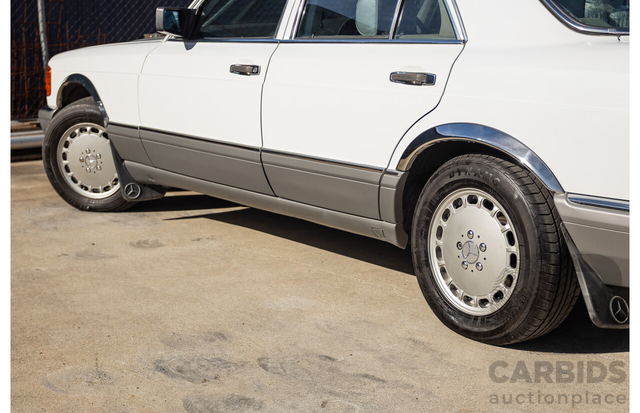 4/1988 Mercedes-Benz 300SE W126 4d Sedan Arctic White 3.0L