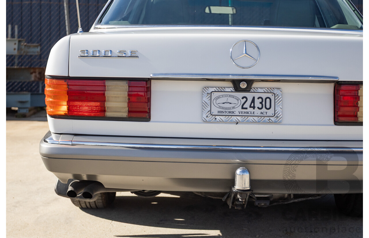 4/1988 Mercedes-Benz 300SE W126 4d Sedan Arctic White 3.0L