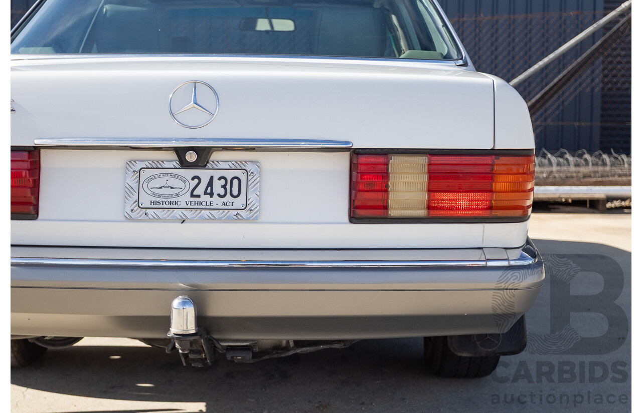 4/1988 Mercedes-Benz 300SE W126 4d Sedan Arctic White 3.0L