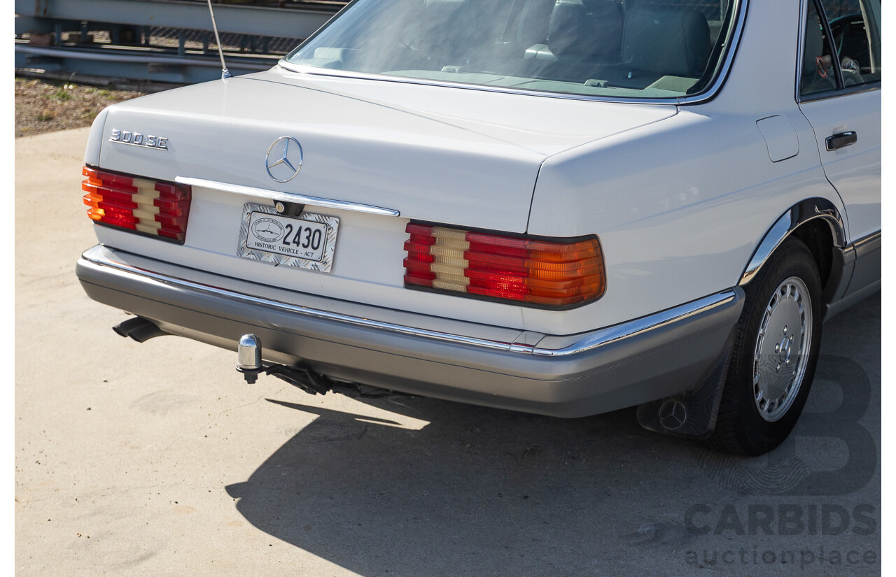 4/1988 Mercedes-Benz 300SE W126 4d Sedan Arctic White 3.0L
