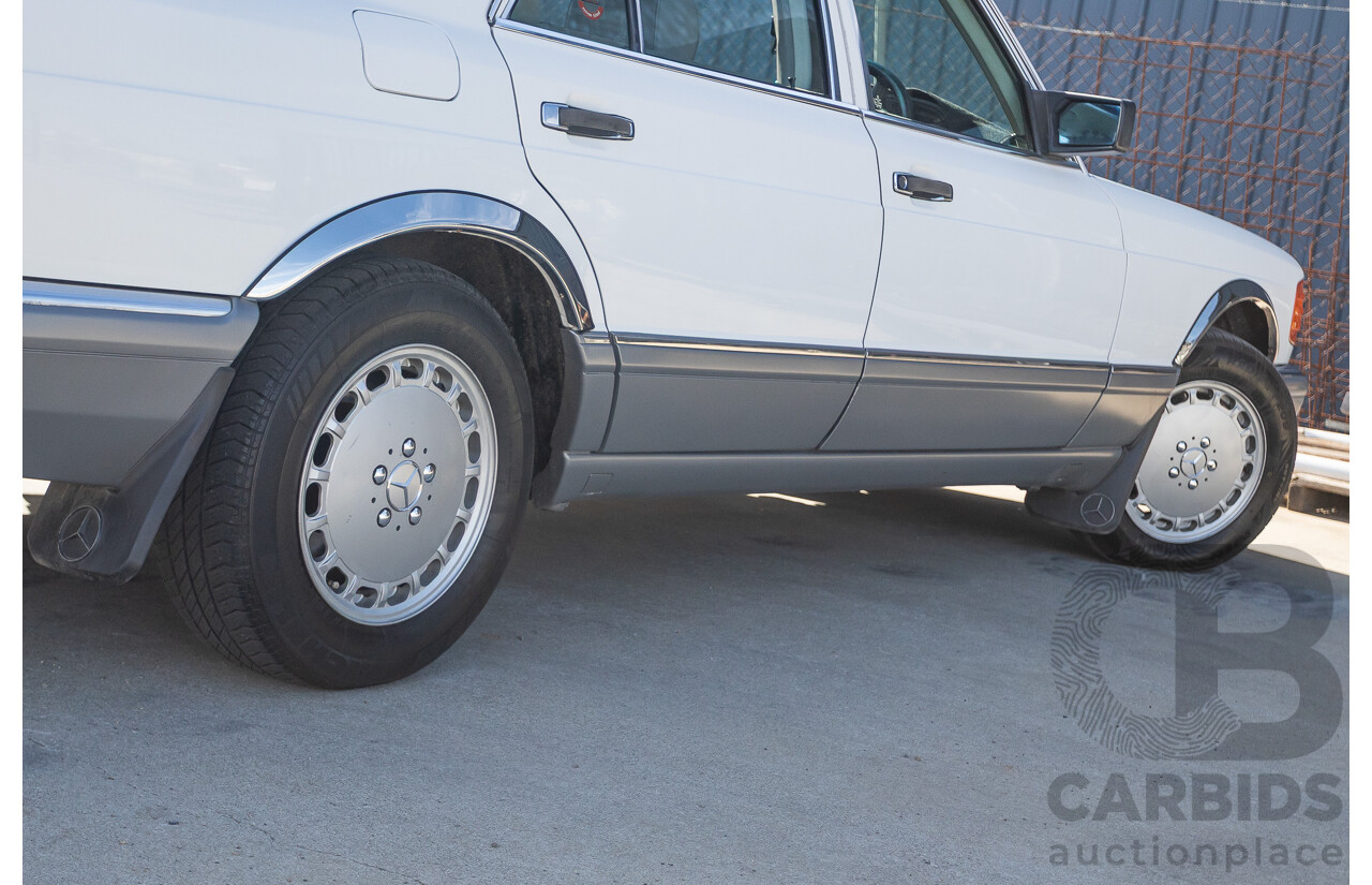 4/1988 Mercedes-Benz 300SE W126 4d Sedan Arctic White 3.0L