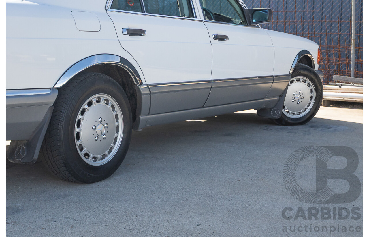 4/1988 Mercedes-Benz 300SE W126 4d Sedan Arctic White 3.0L