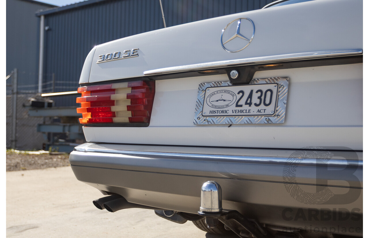 4/1988 Mercedes-Benz 300SE W126 4d Sedan Arctic White 3.0L