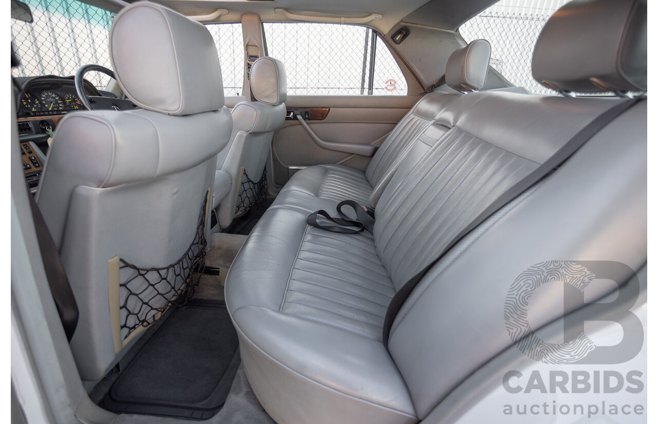 4/1988 Mercedes-Benz 300SE W126 4d Sedan Arctic White 3.0L