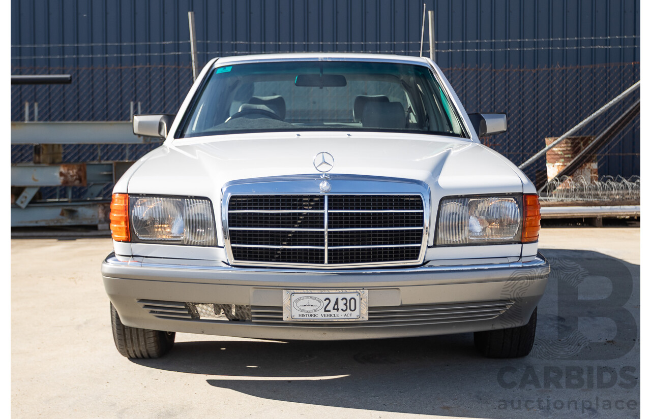 4/1988 Mercedes-Benz 300SE W126 4d Sedan Arctic White 3.0L