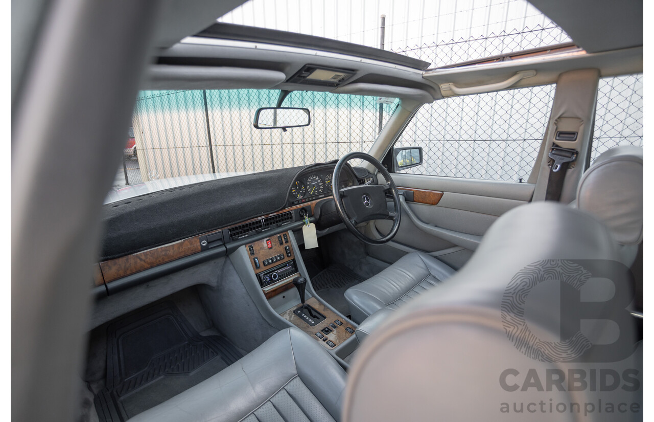 4/1988 Mercedes-Benz 300SE W126 4d Sedan Arctic White 3.0L