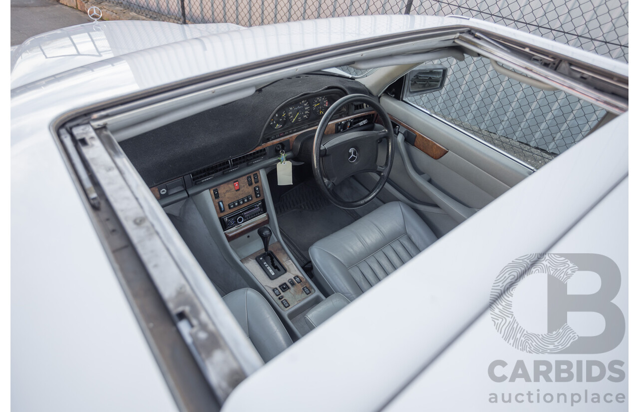 4/1988 Mercedes-Benz 300SE W126 4d Sedan Arctic White 3.0L