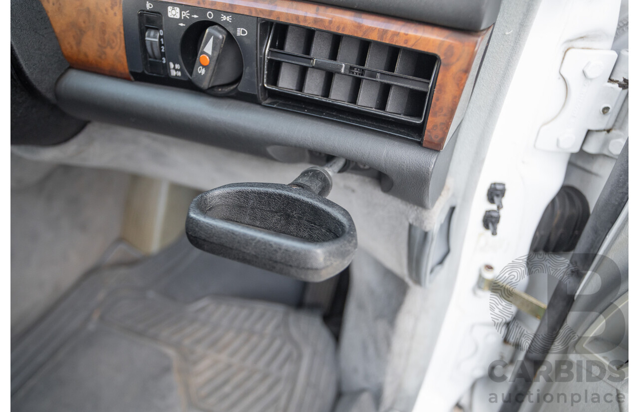 4/1988 Mercedes-Benz 300SE W126 4d Sedan Arctic White 3.0L