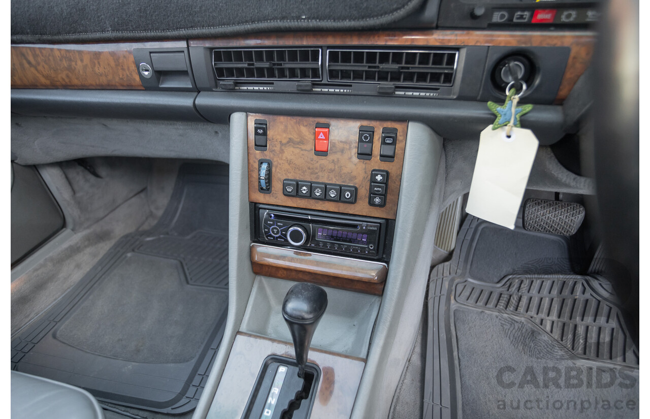 4/1988 Mercedes-Benz 300SE W126 4d Sedan Arctic White 3.0L