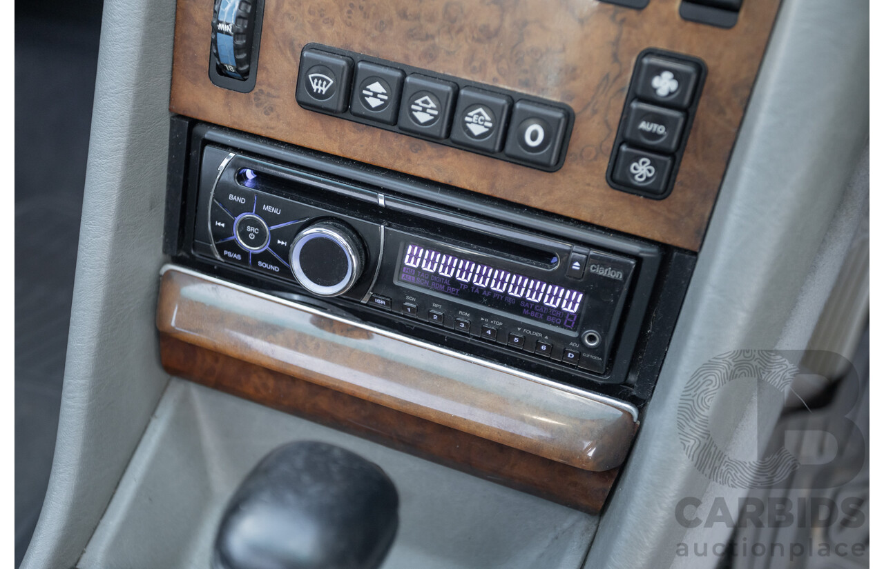 4/1988 Mercedes-Benz 300SE W126 4d Sedan Arctic White 3.0L