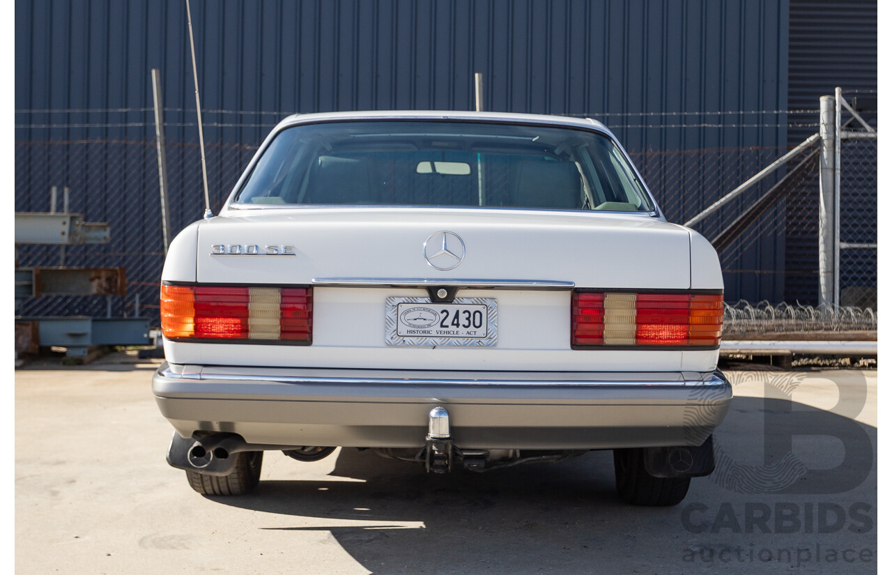 4/1988 Mercedes-Benz 300SE W126 4d Sedan Arctic White 3.0L