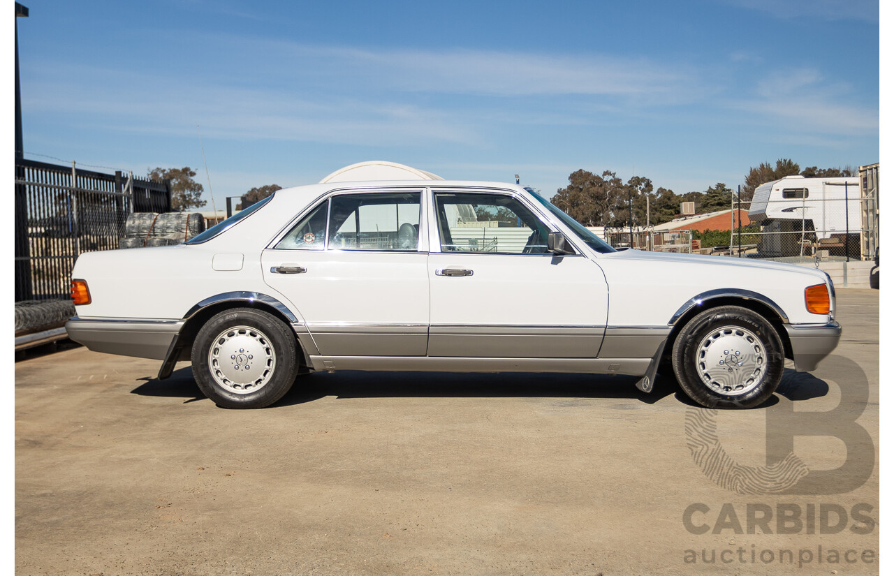 4/1988 Mercedes-Benz 300SE W126 4d Sedan Arctic White 3.0L