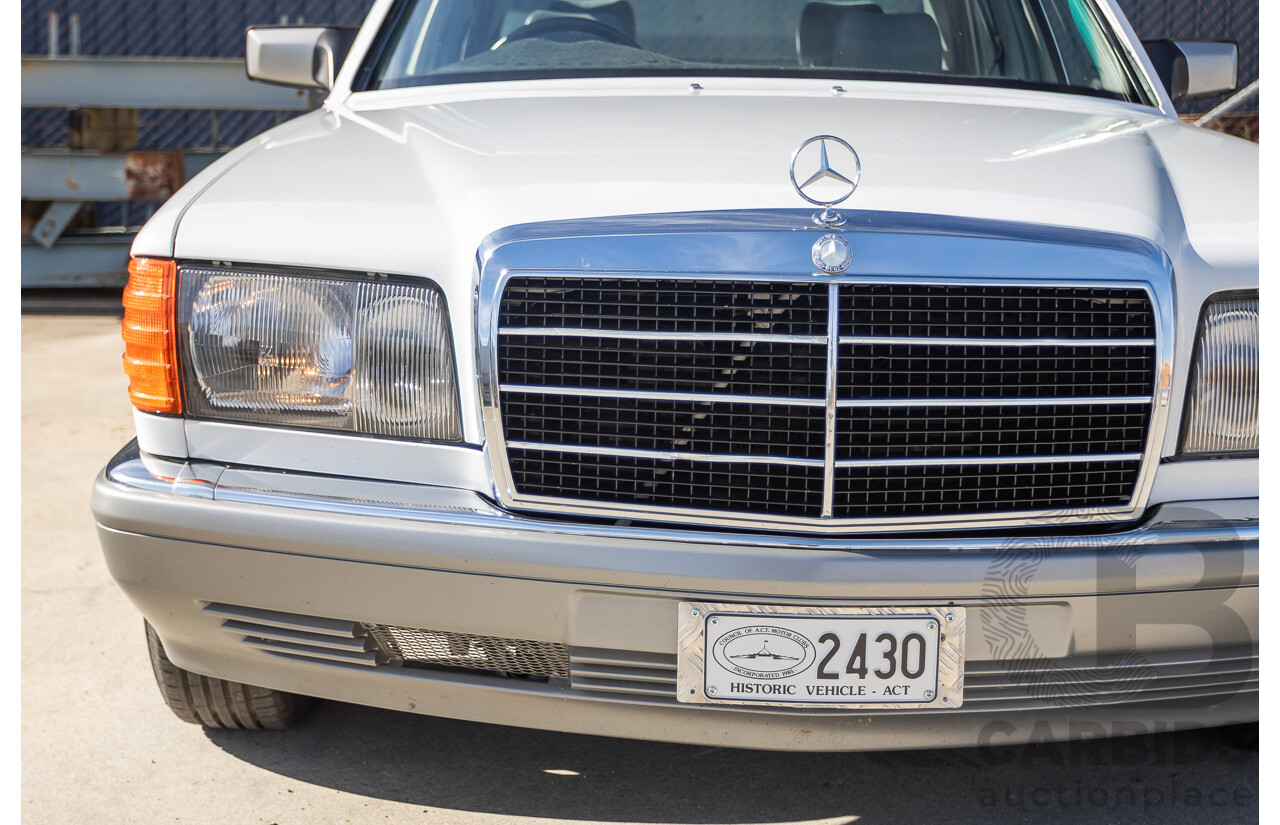 4/1988 Mercedes-Benz 300SE W126 4d Sedan Arctic White 3.0L