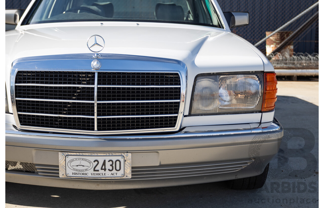 4/1988 Mercedes-Benz 300SE W126 4d Sedan Arctic White 3.0L