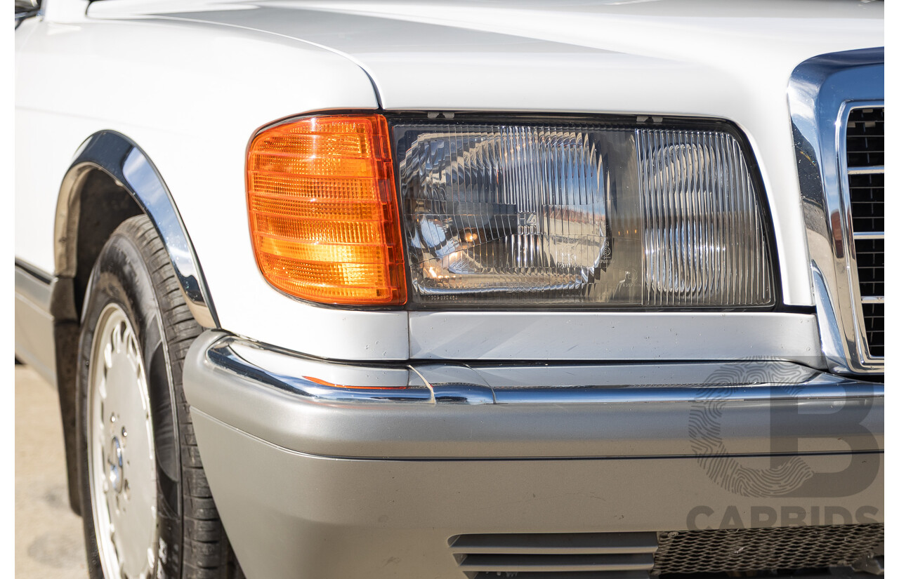 4/1988 Mercedes-Benz 300SE W126 4d Sedan Arctic White 3.0L