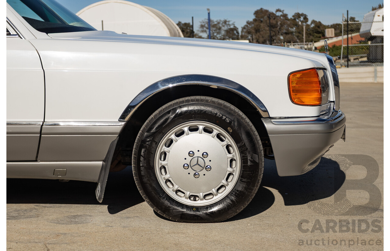 4/1988 Mercedes-Benz 300SE W126 4d Sedan Arctic White 3.0L