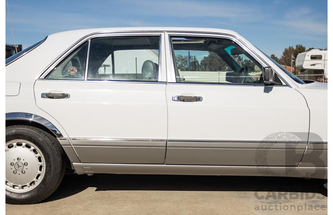 4/1988 Mercedes-Benz 300SE W126 4d Sedan Arctic White 3.0L