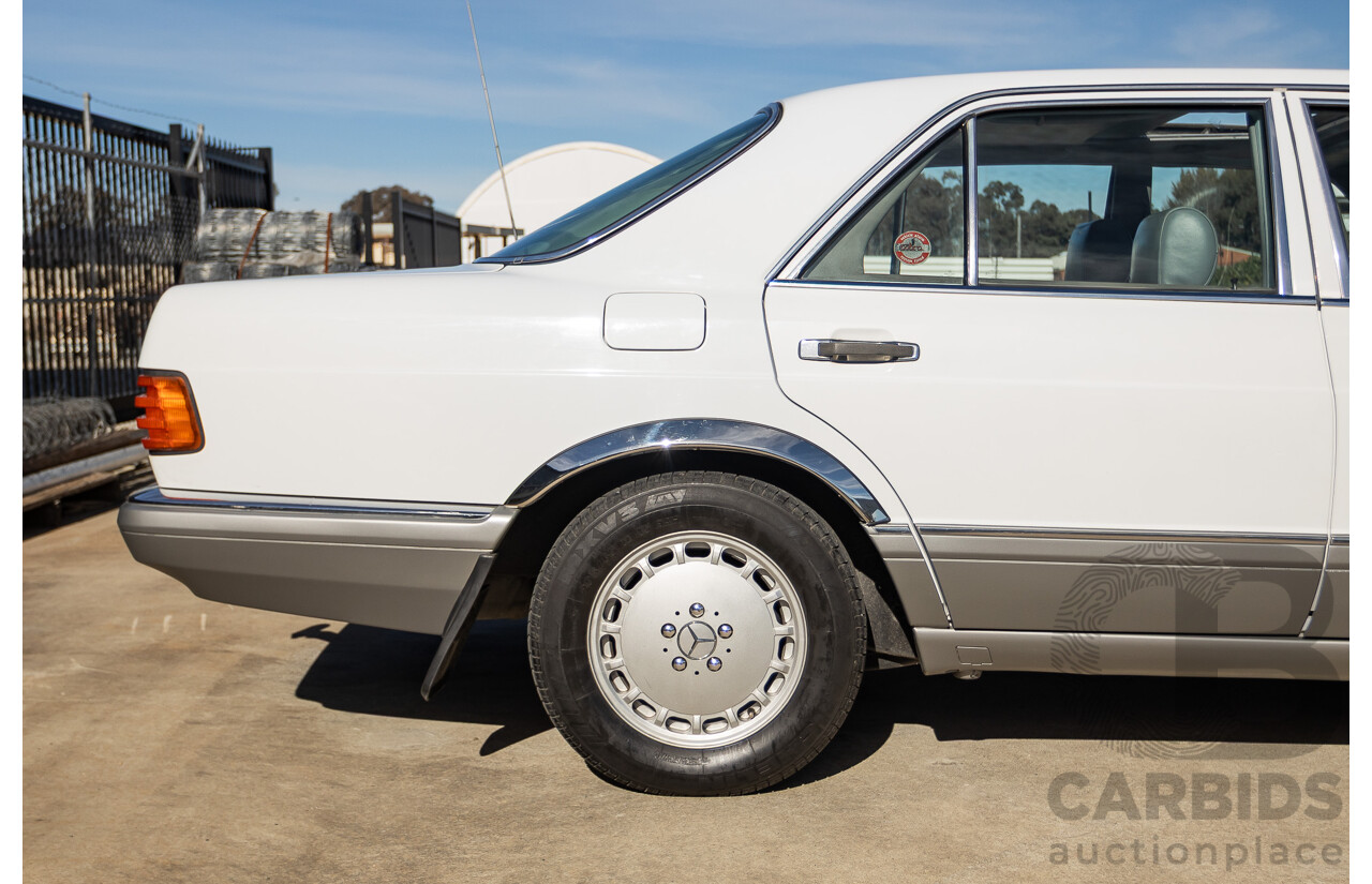 4/1988 Mercedes-Benz 300SE W126 4d Sedan Arctic White 3.0L