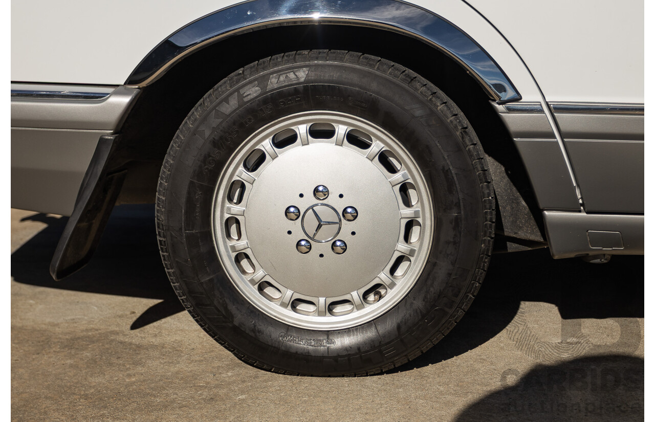 4/1988 Mercedes-Benz 300SE W126 4d Sedan Arctic White 3.0L