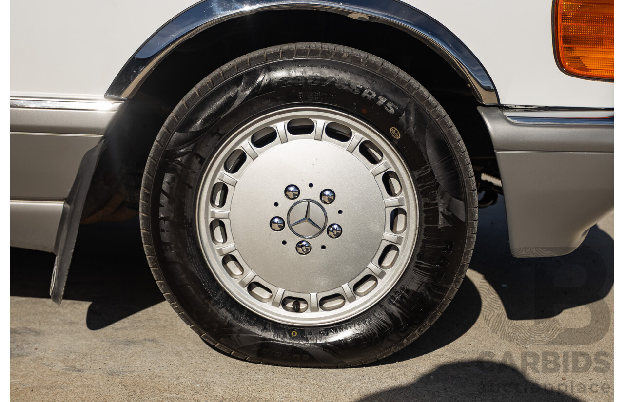 4/1988 Mercedes-Benz 300SE W126 4d Sedan Arctic White 3.0L