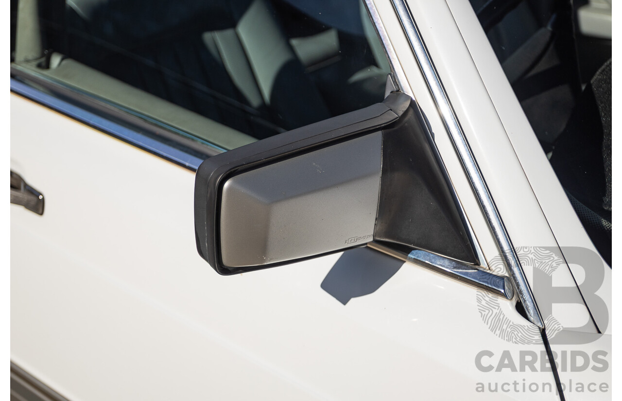 4/1988 Mercedes-Benz 300SE W126 4d Sedan Arctic White 3.0L