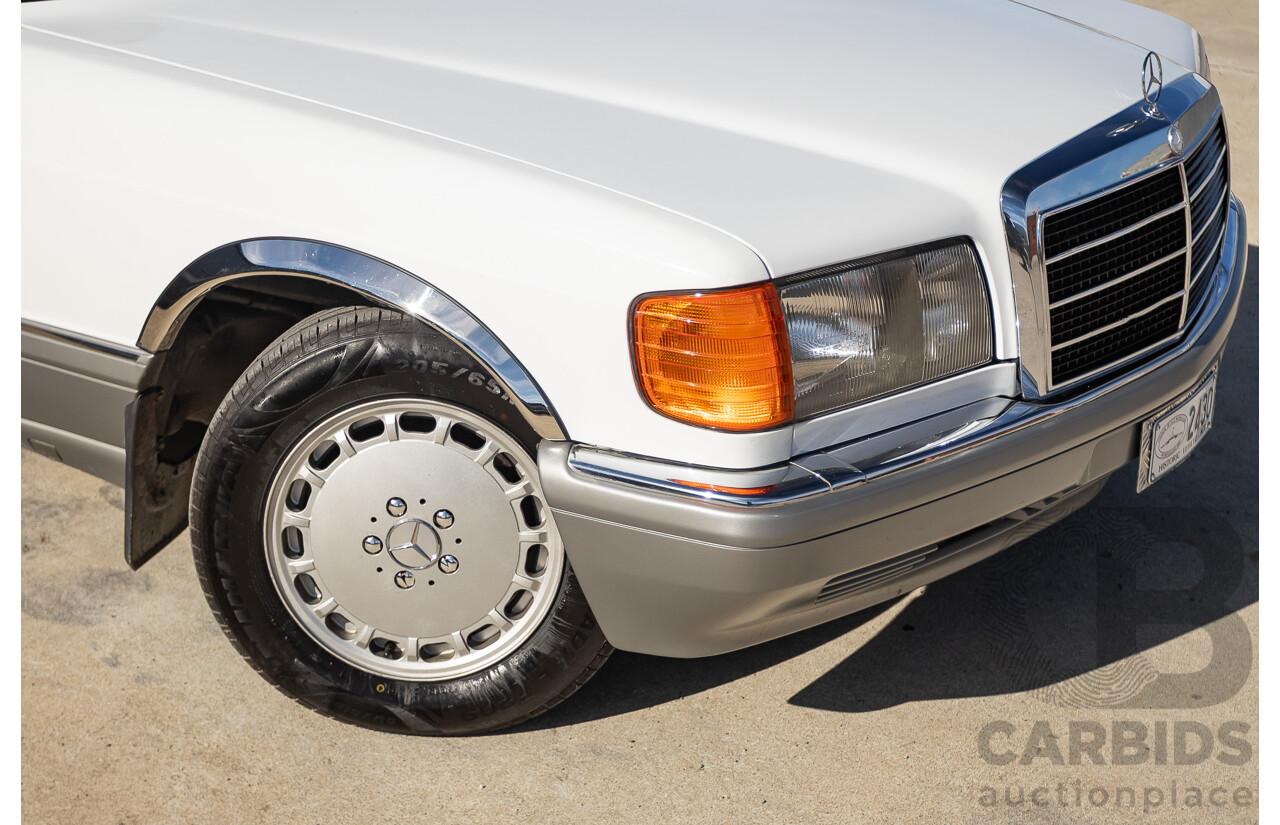 4/1988 Mercedes-Benz 300SE W126 4d Sedan Arctic White 3.0L