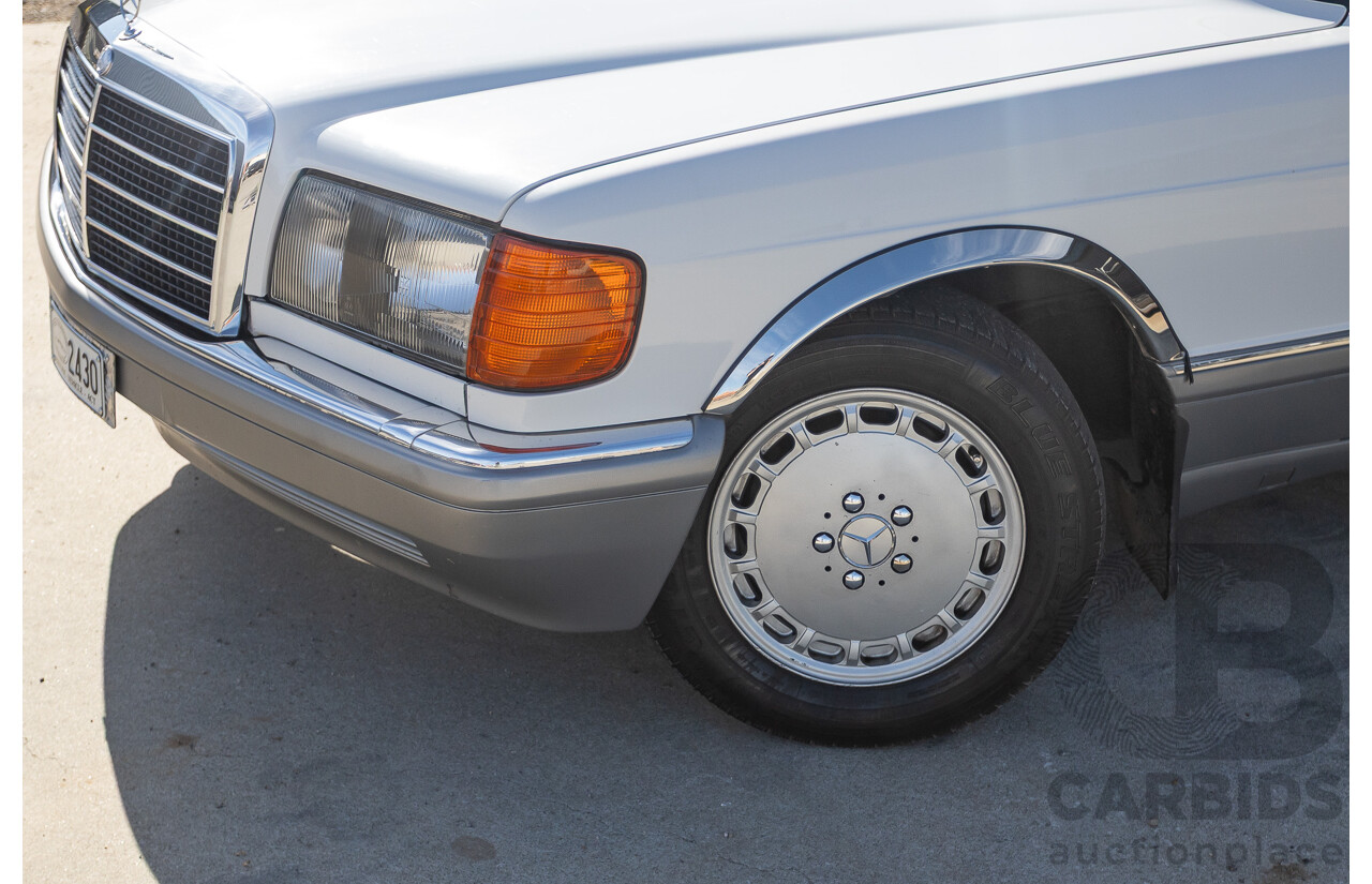 4/1988 Mercedes-Benz 300SE W126 4d Sedan Arctic White 3.0L