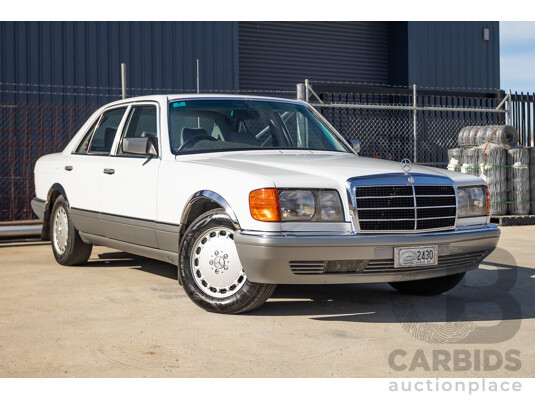 4/1988 Mercedes-Benz 300SE W126 4d Sedan Arctic White 3.0L