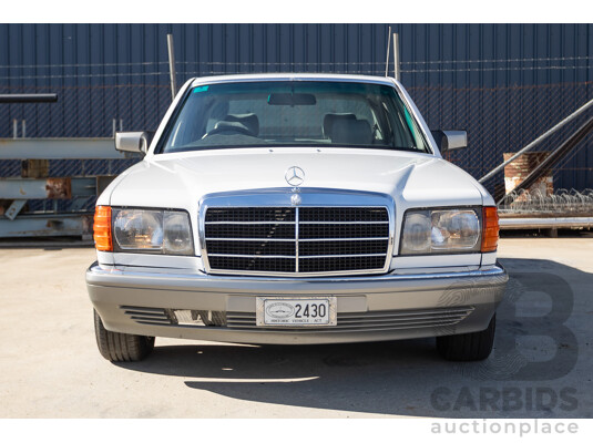 4/1988 Mercedes-Benz 300SE W126 4d Sedan Arctic White 3.0L