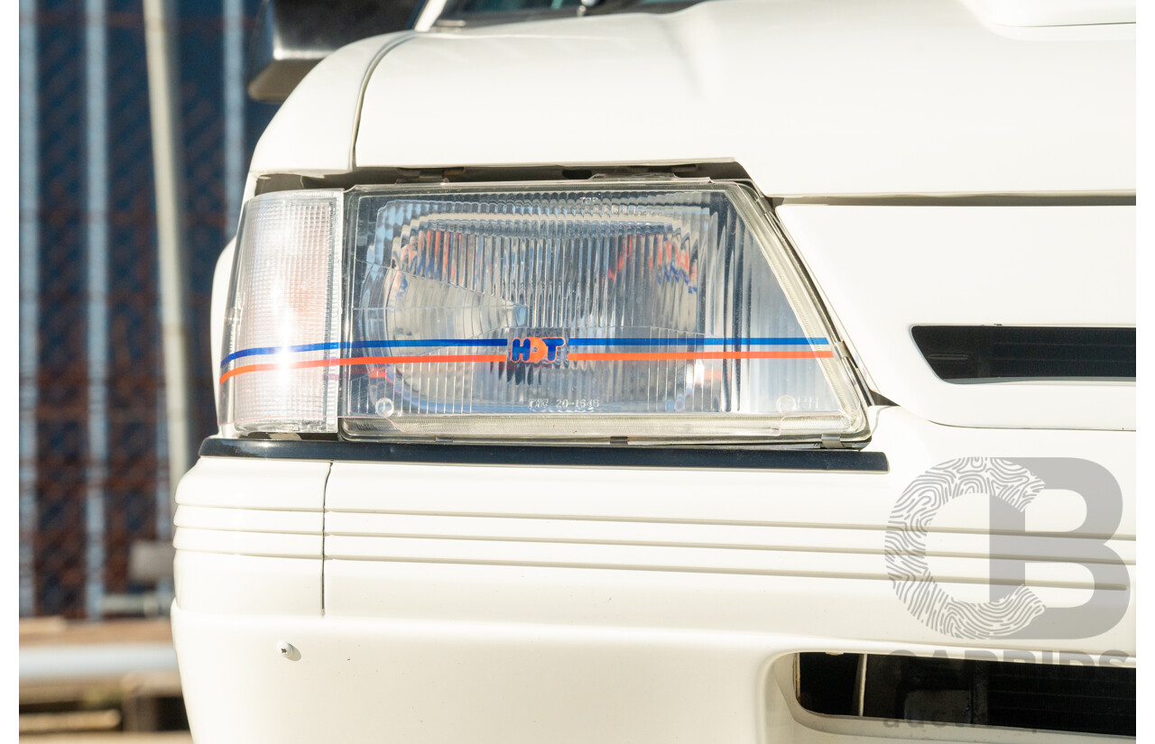 10/1984 Holden VK Commodore SL (134 Package) Groupe 3 Tribute 4d Sedan Alpine White V8 5.0L - Modified