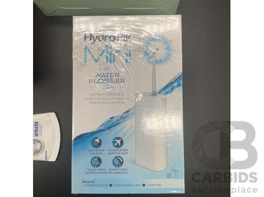 BRAUN Oral-B Pro 1500X Electric Toothbrush, WHITE GLO Advanced Teeth Whitening Kit, PIKSTERS HydroPik Mini Water Flosser and SENDOSDYNE Toothpaste - Lot of 4